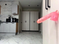 Gorgeous Blonde Strips And Teases With Wall Mounted Dildo