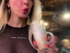 Cute Girl Reads A Book In Cafe With No Bra With Her Nipple